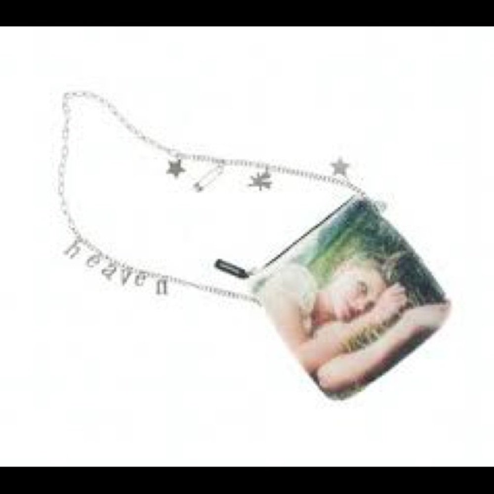 iSO in search of Marc Jacobs Heaven virgin suicide lux bag